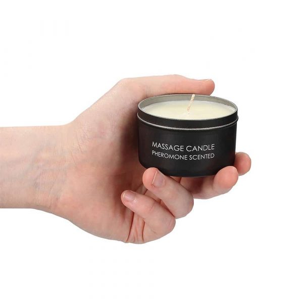 Ouch Massage Candle Pheromone Scented in hand