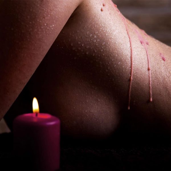 Ouch Wax Play Candle Rose Scented on model