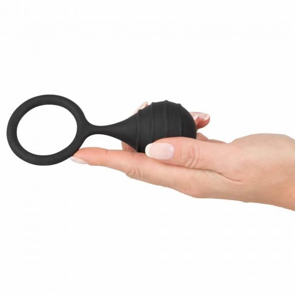 Black Velvet Cock Ring And Weight in hand