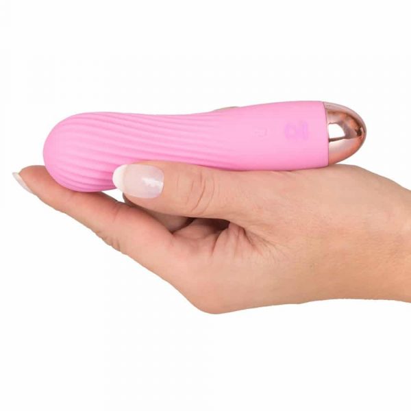 Cuties Silk Touch Rechargeable Mini Vibrator (Pink) in hand