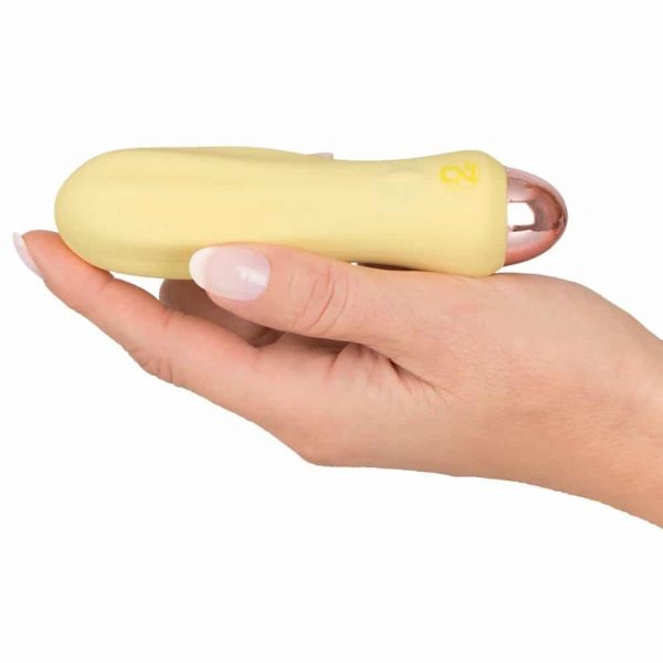 Cuties Silk Touch Rechargeable Mini Vibrator (Yellow) in hand