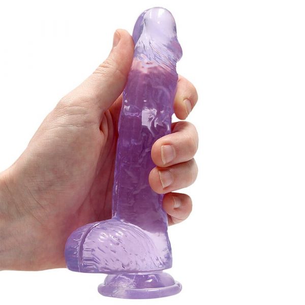 RealRock 6 Inch Purple Realistic Crystal Clear Dildo in hand